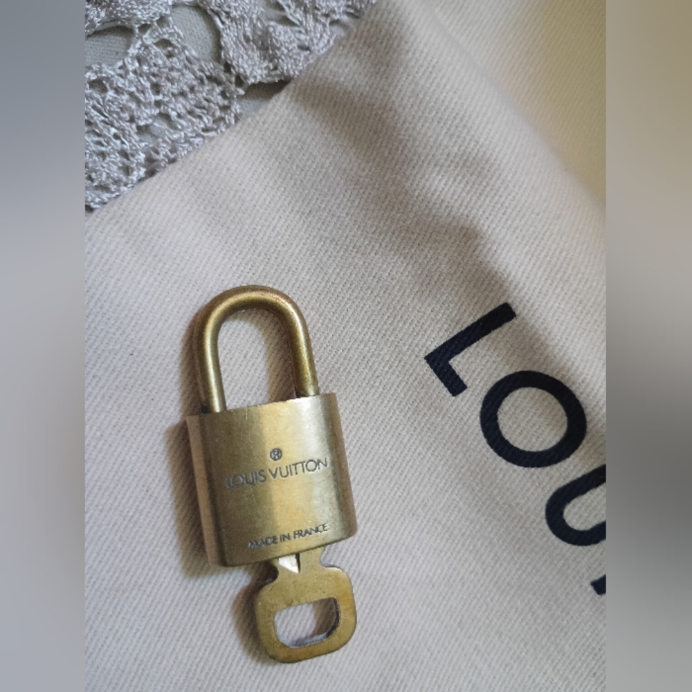 Authentic Louis Vuitton Lock & Key # 310 - Picture 11 of 11